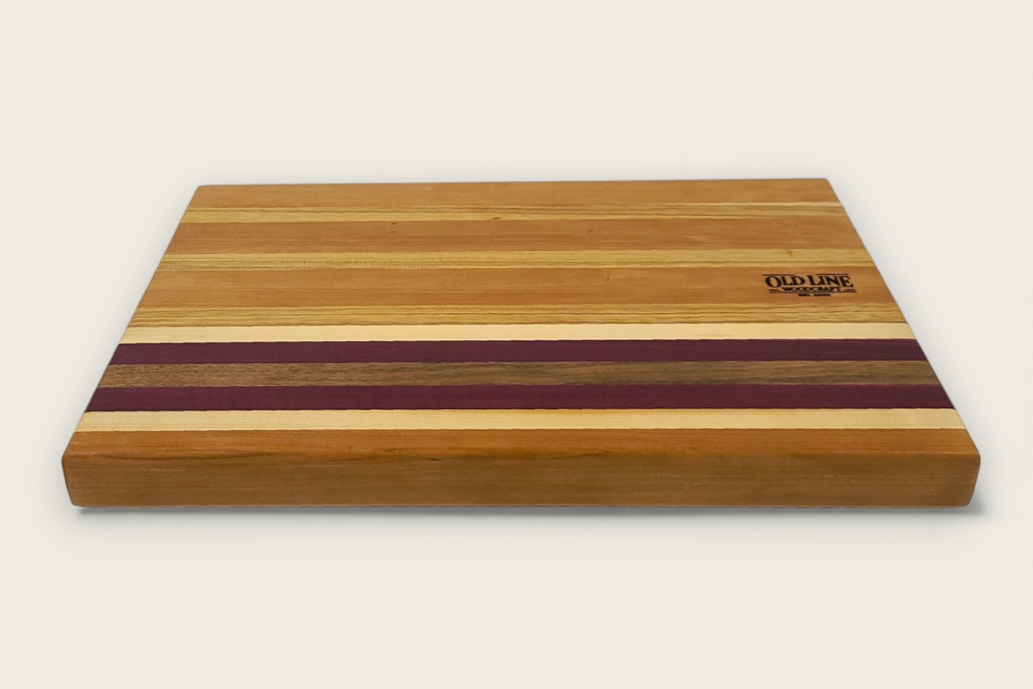 Culinary Butcher Block Board (#130) in cherry wood with edge grain, horizontal pattern, and recessed handles.